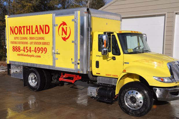 Northland Septic Maintenance truck in a driveway