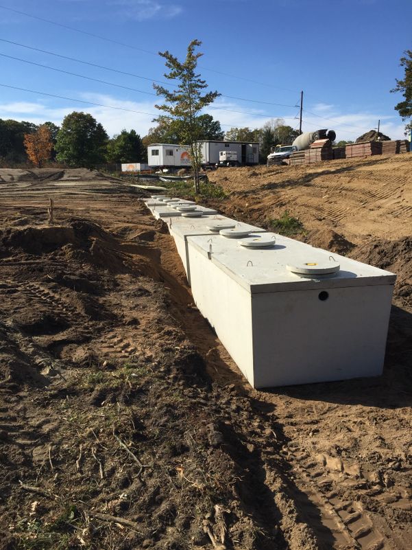 Line of septic tanks half buried