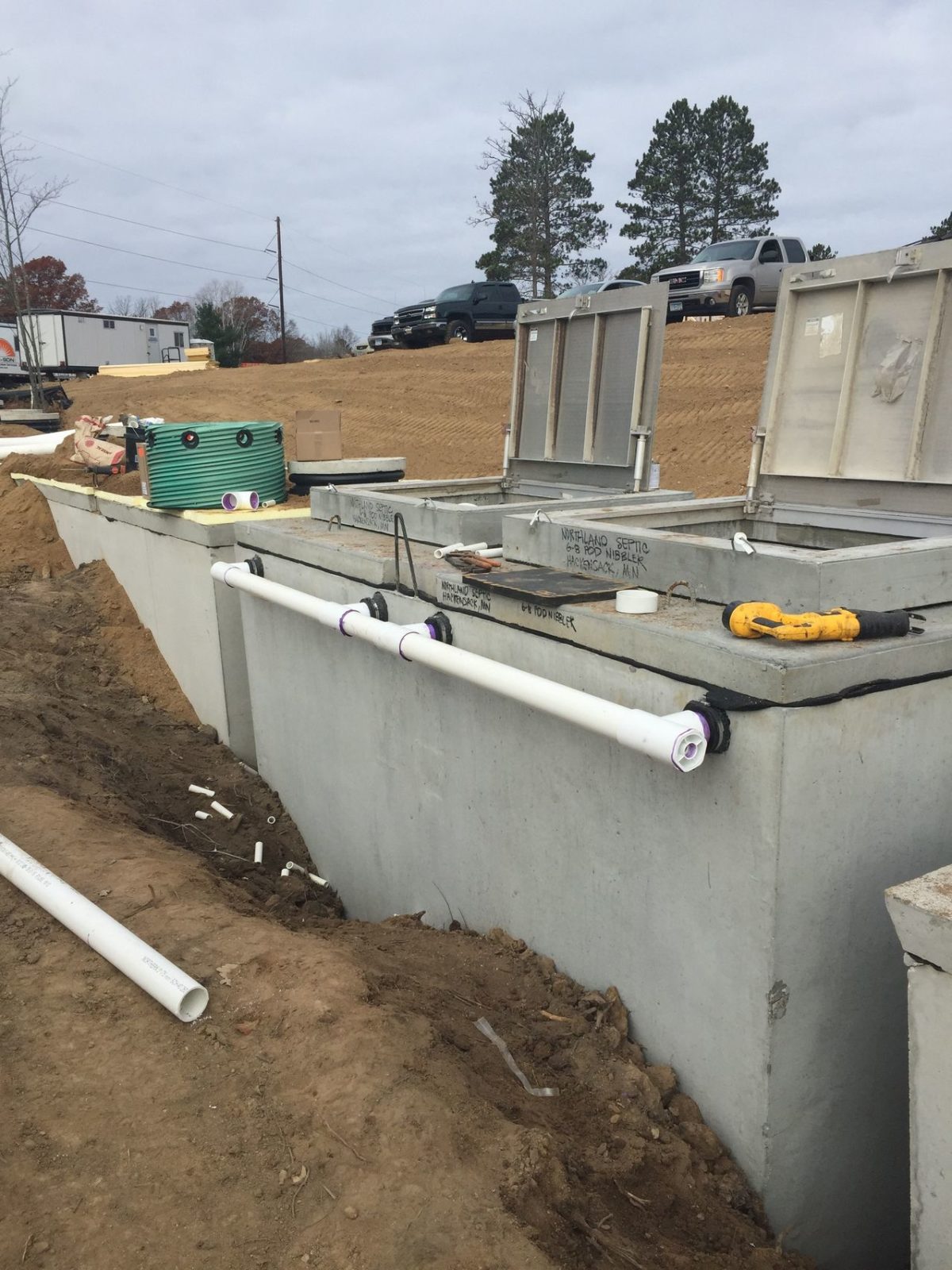 Open concrete septic tanks